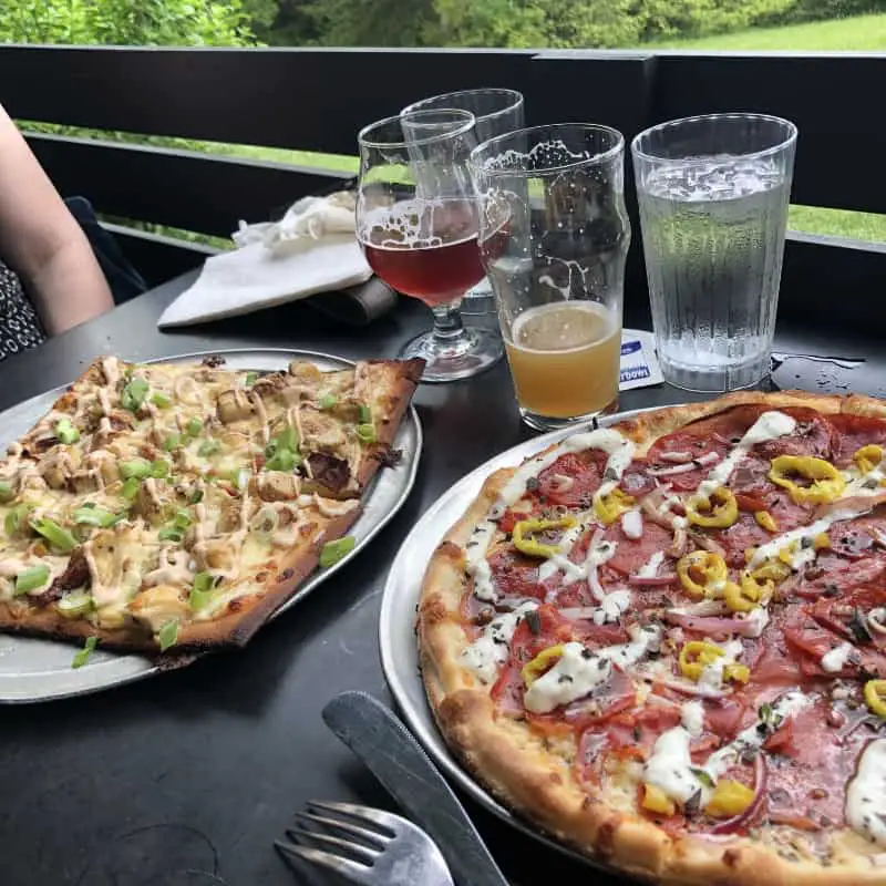 Image of pizza and beers at Pies and Pints 