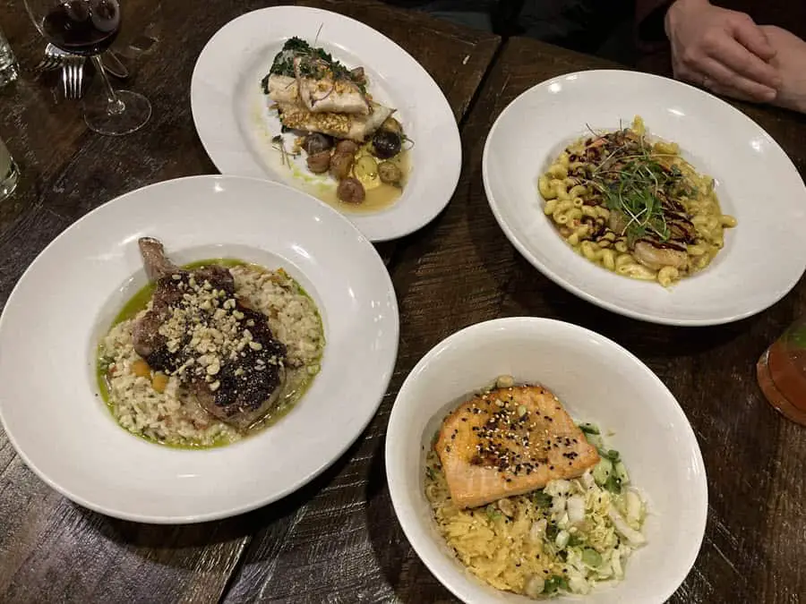 Image of 4 delicious plates of food from the Blind Horse Restaurant in Kohler WI