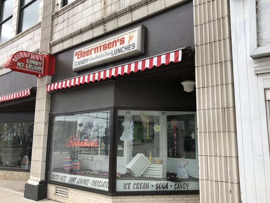 Image of storefront.  Neon sign reads "Beerntsen's. 