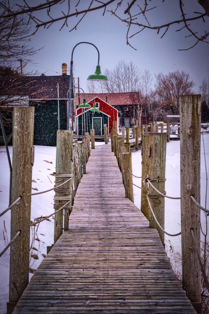 Image of boardwalk that takes you to a small fishing village