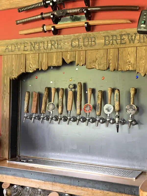 Image of beer taps at Adventure Club Brewing in Bayfield WI