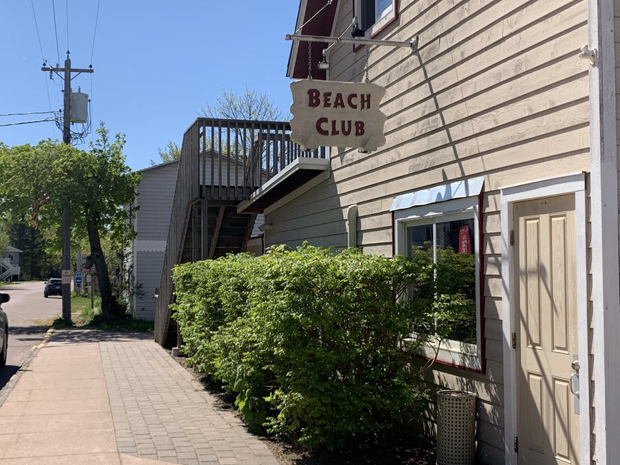 Image of the front of the Beach Club Restaurant and Bar on Madeline Island