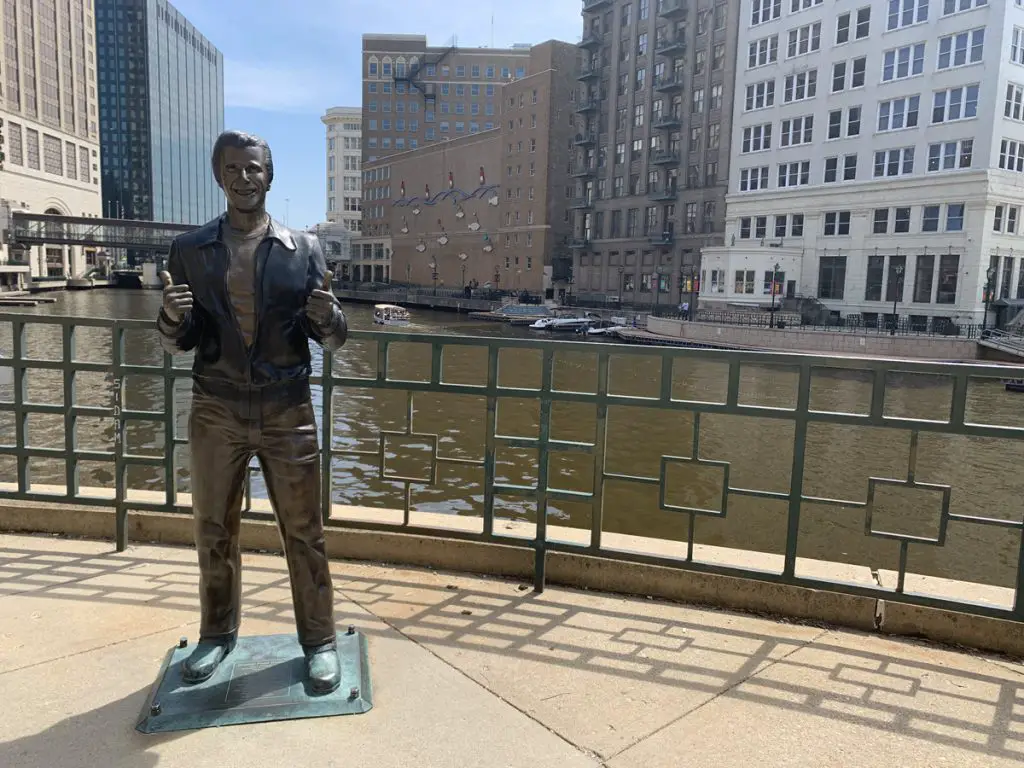 Image of the Bronz Fonz with the Milwaukee River in the background