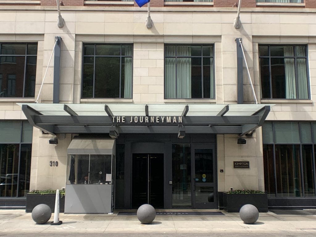 Image of the outside entrance into the Kimpton Journeyman Hotel in Milwaukee WI