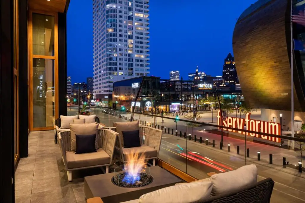 Outdoor patio with gas firepits at The Trade Hotel