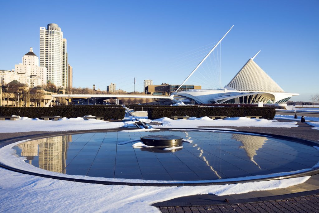 Image of Milwaukee Art Museum in Winter with snow covered ground around it